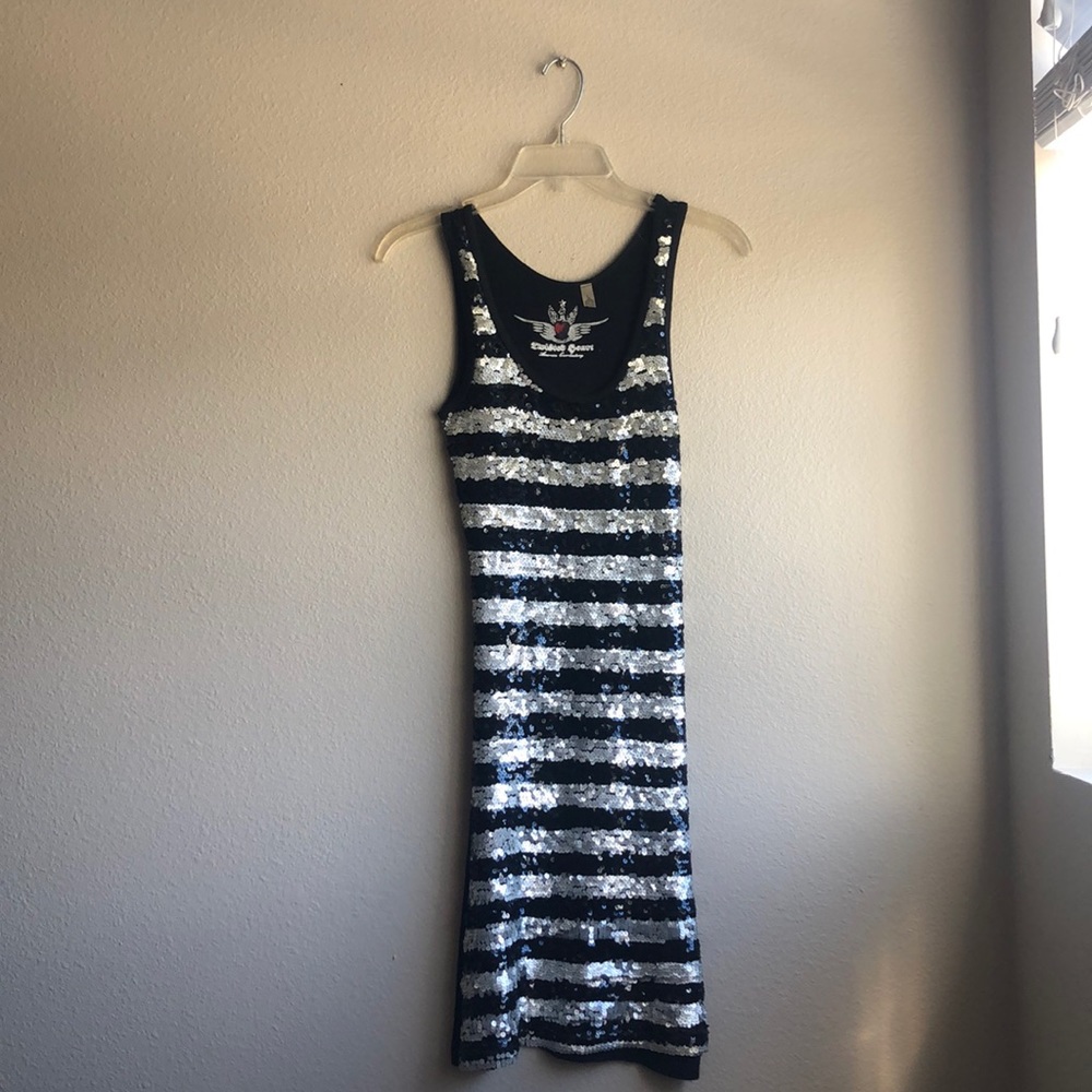 A super cute dress it’s more of a small/medium fit